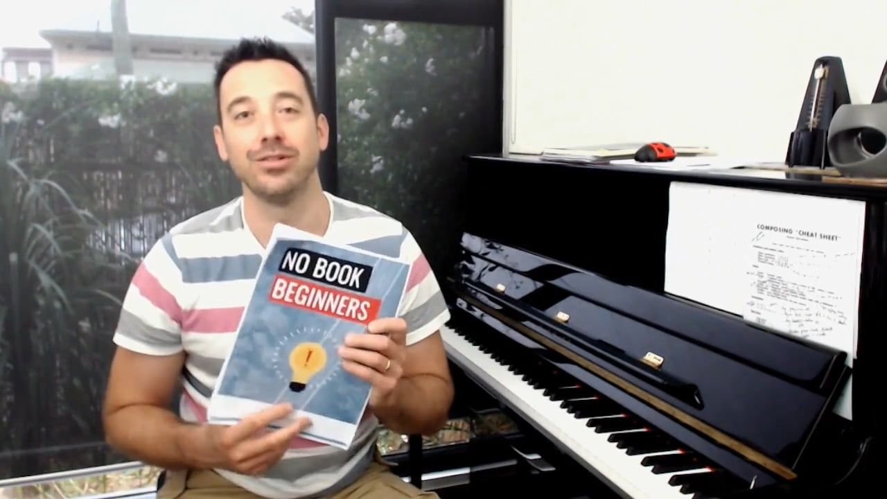 Tim at the piano, introducing the No Book Beginner Framework